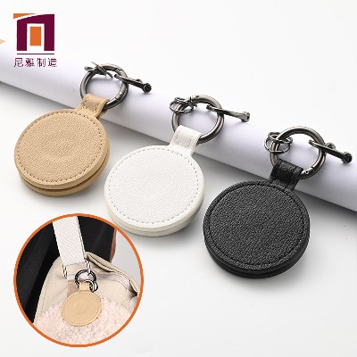 Wholesale of circular PU leather magnetic hat clips by manufacturers, portable and caring leather hanging clip, sun storage hat clip