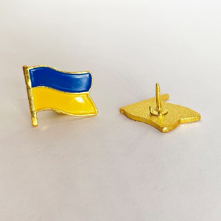 Wholesale of UKR badges by manufacturers, metal badges, baking paint process, short construction period, complete variety, large quantity, and discounts